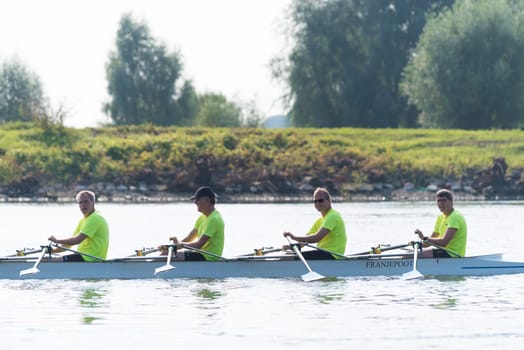 DEVENTER, NETHERLANDS - AUGUST 27, 2016: canoe with team of sports rowers on the dutch ijssel river