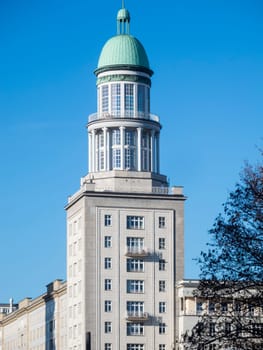 View of the North Tower at Fankfurter Tor with blue sky in Berlin in 2017. This tower contains the gallery in the tower.