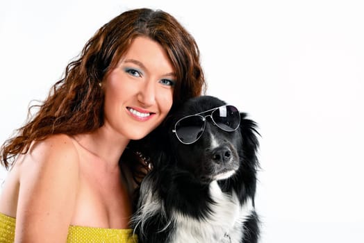Pretty young woman with border collie