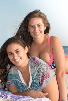 Group of happy teenage girls at the beach