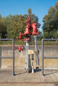 water cannon next to a sluice