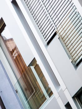 Windows are located in the pedestrian zone of the city of Füssen in an oblique view.
