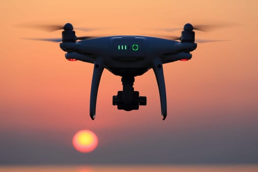 KAGAWA, JAPAN - JUNE 15, 2017: Remote controlled drone Dji Phantom 4 Pro equipped with high resolution video camera flying in air and sunset sky.