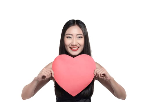 Valentine day concept. Beautiful asian girl holding red heart