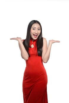 Asian woman in cheongsam dress isolated over white background. Happy chinese new year concept
