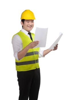Asian worker wearing safety vest and yellow helmet holding blueprint isolated over white background