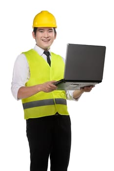 Asian worker wearing safety vest and yellow helmet holding laptop isolated over white background