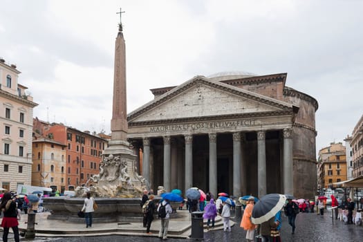 Rome, Italy - October 01, 2015. The Pantheon is an ancient Roman building located in the historic center. Tourists on a rainy day. Rome, Italy