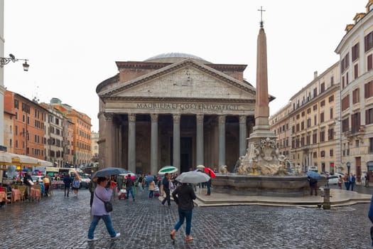 Rome, Italy - October 01, 2015. The Pantheon is an ancient Roman building located in the historic center. Tourists on a rainy day. Rome, Italy