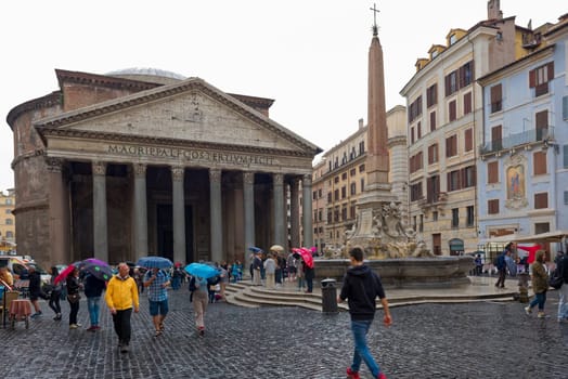Rome, Italy - October 01, 2015. The Pantheon is an ancient Roman building located in the historic center. Tourists on a rainy day. Rome, Italy
