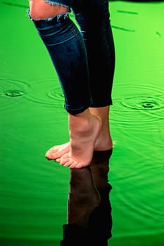 The legs of young beautiful woman. Studio shot