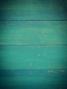 Weathered old wooden plank in vintage blue using as background