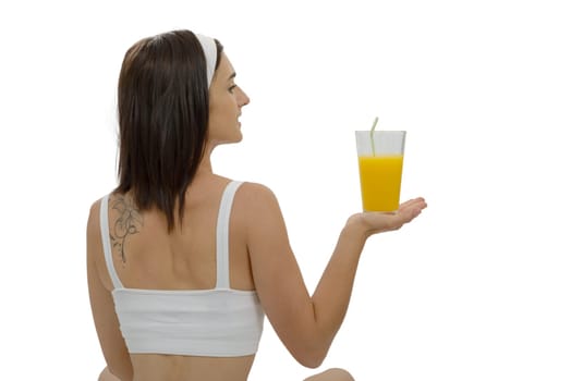 a beautiful young woman with orange juice
