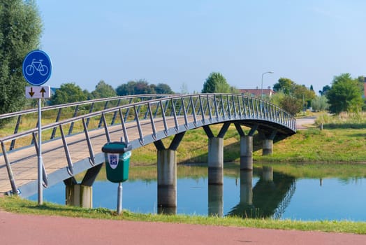 small bicycle bridge over a canal