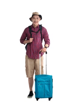Young male tourist carry suitcase isolated over white background