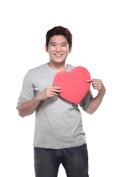 Asian man holding red heart. Valentine's day concept