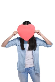 Valentine day concept. Beautiful asian girl holding red heart