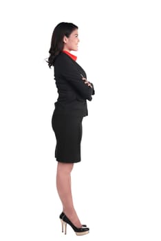 Asian business woman standing side view isolated over white background