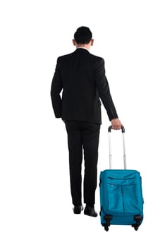 Back view of business man walking with suitcase isolated over white background