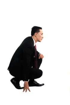 Asian business man squat isolated over white background