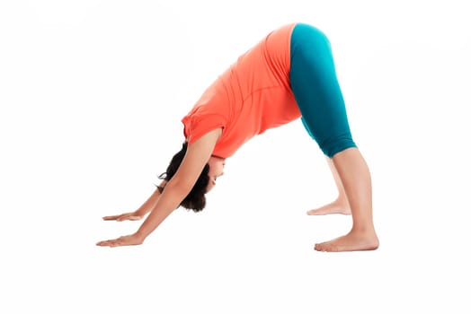 Asian pregnant woman doing yoga over isolated white background
