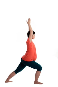 Asian pregnant woman doing yoga over isolated white background
