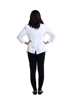 Back view of a female doctor looking at white. Full length shot