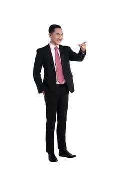 Asian business man pointing something isolated over white background