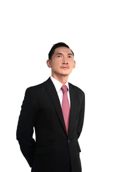 Asian man looking up isolated over white background