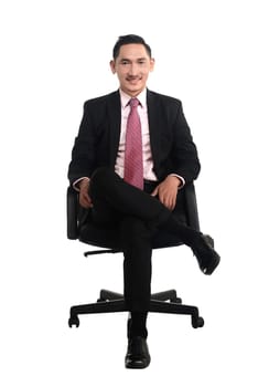 Business man sitting on the chair isolated over white background