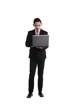 Asian business man holding laptop isolated over white background