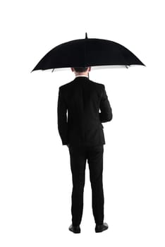 Back view business man standing holding umbrella isolated over white background