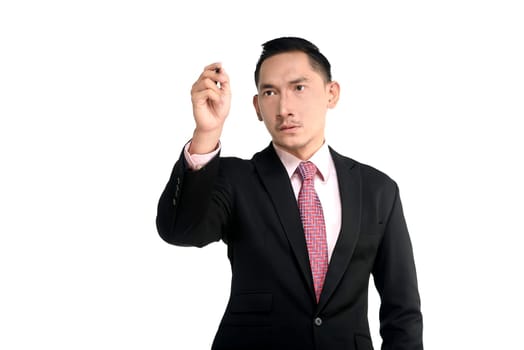 Asian business man writing something with pen isolated over white background
