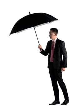 Asian business man holding black umbrella isolated over white background