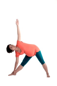 Asian pregnant woman doing yoga over isolated white background