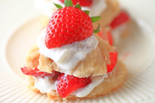 Small fresh strawberry shortcakes closeup