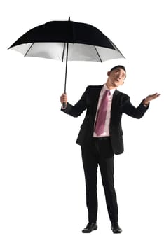Asian business man holding black umbrella isolated over white background