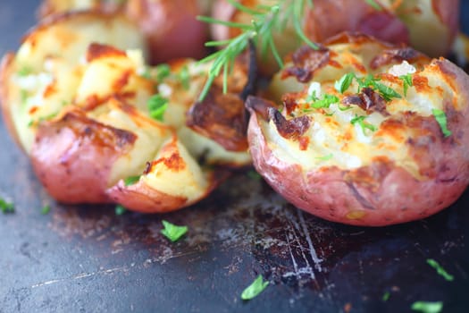 Crushed potatoes roasted with fresh rosemary and parsley