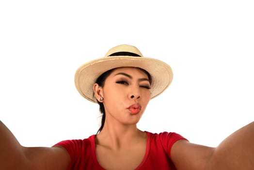 Pretty girl make a duck face, and take a selfie portrait
