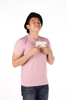 Asian man doing selfie isolated over white background