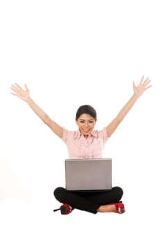 Asian business woman working on a laptop and sitting on the floor isolated over white background