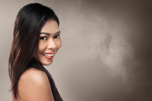 Beautiful asian woman smile over blur background