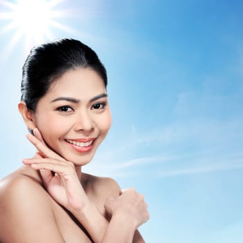 Beautiful asian woman in studio with abstract blur background