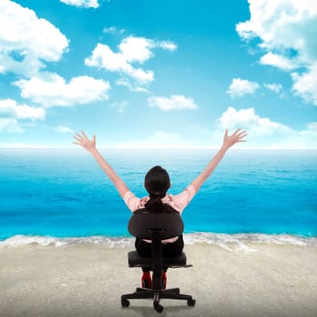 Young business woman relaxing on the beach. The office floor transform into beach