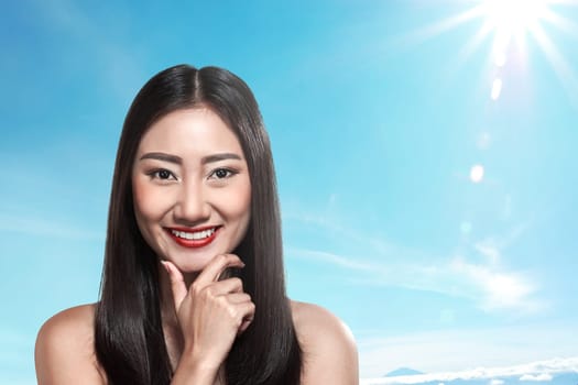 Beautiful asian woman over blur background
