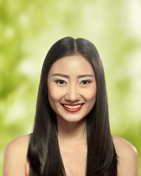 Beautiful asian woman over blur background