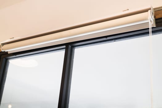 Textile roll curtain window blind, stock photo