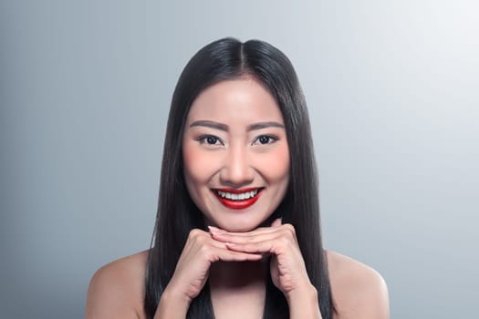 Beautiful asian woman over blur background