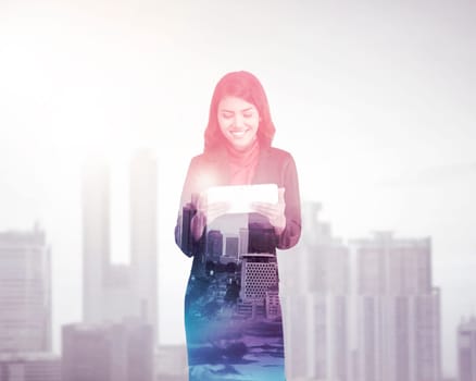 Business woman with multiple exposure holding tablet computer. Business technology concept