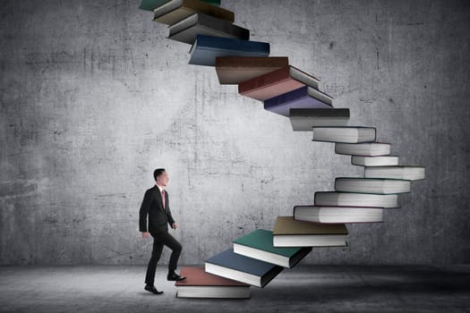 Business person step up flying book that look like stair. Career and education concept